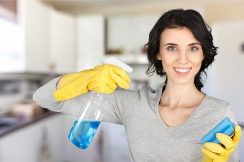 Office cleaning service working in a Hammersmith meeting room